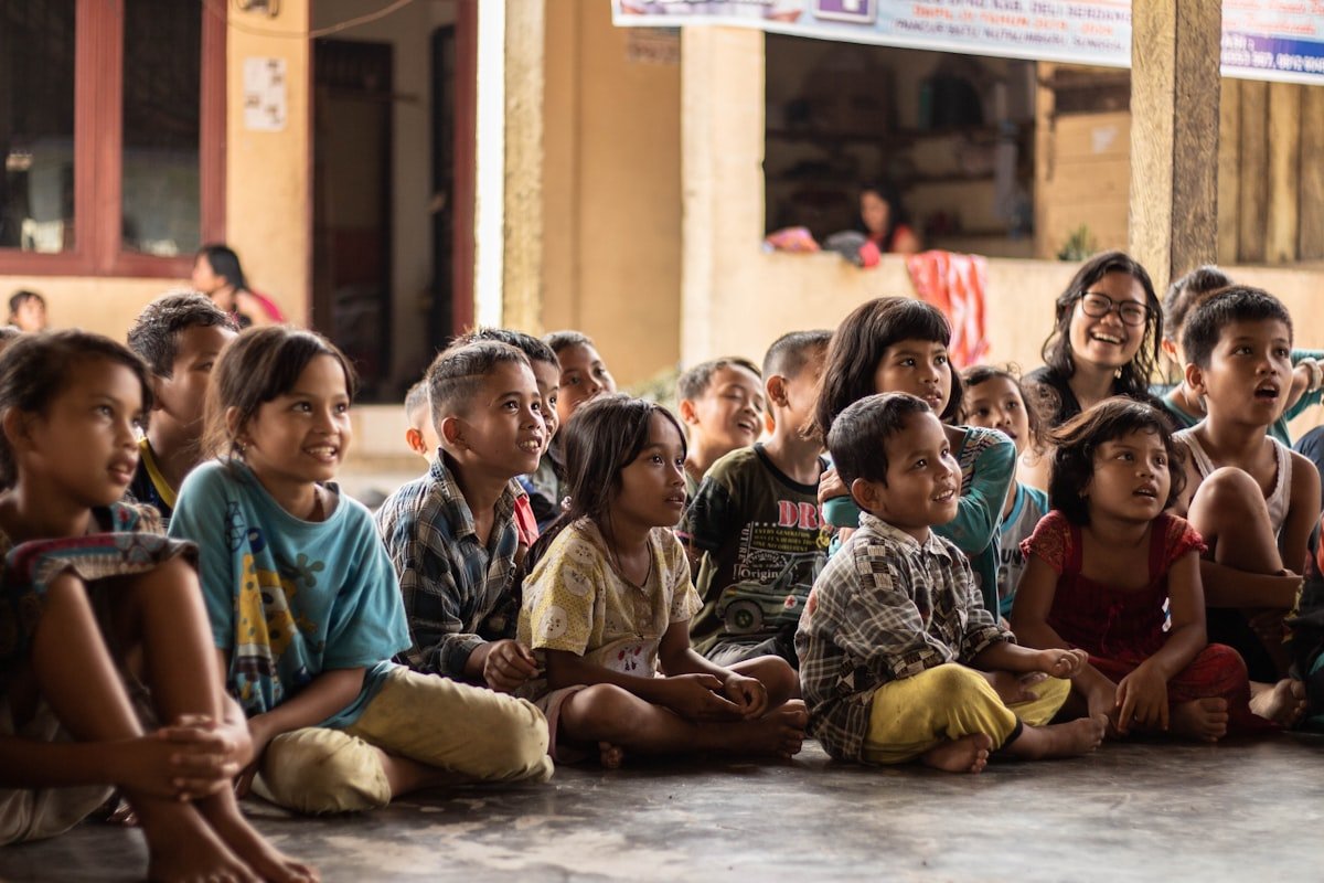 Educators and children learning together in a classroom